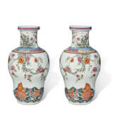 A PAIR OF FAMILLE ROSE 'CARP AND FLOWERING BRANCHES' VASES - photo 1