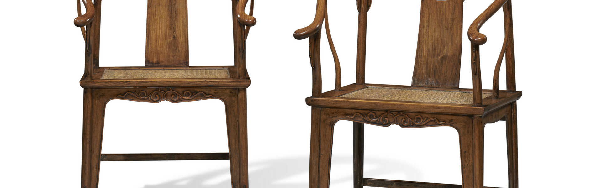 A PAIR OF HUANGHUALI HORSESHOE-BACK ARMCHAIRS