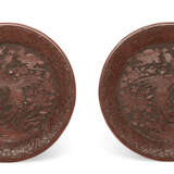 A PAIR OF CARVED RED LACQUER ‘PHOENIX’ DISHES - photo 1