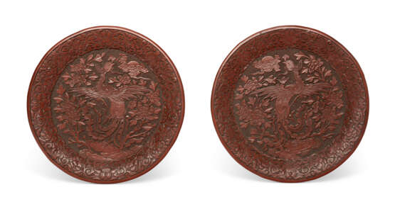 A PAIR OF CARVED RED LACQUER ‘PHOENIX’ DISHES - photo 1