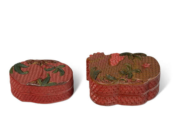 TWO CARVED RED, GREEN AND OCHER LACQUER FRUIT-SHAPED BOXES AND COVERS - photo 1