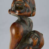 A CARVED WOOD NETSUKE OF ASHINAGA - photo 5