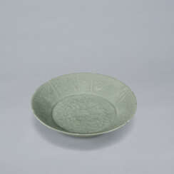 A LOBED CELADON STONEWARE DISH WITH MOLDED PEONY DESIGN