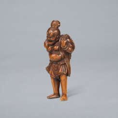 A CARVED WOOD NETSUKE OF A NIO CARRYING ANLARGE STRAW SANDE