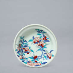 A CIRCULAR PORCELAIN DISH