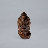 A LACQUERED AND CARVED WOOD NETSUKE OF HEAD OF A NIO - photo 1