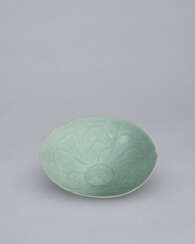 A LARGE LOBED CELADON BOWL WITH INCISED PEONY