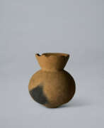 Irdenware. AN EARTHENWARE JAR