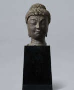 Eisen. A LARGE CAST IRON HEAD OF BUDDHA