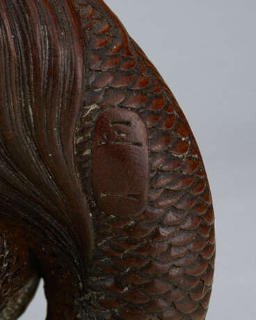 A CARVED WOOD NETSUKE OF A MERMAID HOLDING HER CHILD - photo 6