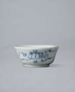 Coupe (Articles ménagers, Vaisselle, Vaisselle à boire). A SMALL BLUE-AND-WHITE PORCELAIN CUP