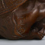 A CARVED WOOD NETSUKE OF A ONI UNDER HAT - фото 7