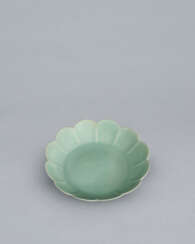 A CHRYSANTHEMUM-FORM CELADON DISH