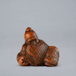A CARVED NETSUKE OF ROSEI (LU SHENG) IN HIS DREAM