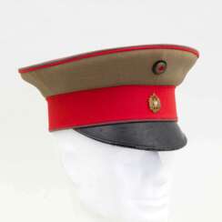 Kaiserreich, Schirmmütze eines Offiziers mit Abzeichen der Schutztruppe.