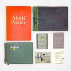 Konvolut Ausweisdokumente, Fotoalben und Zigarettenbilderalbum.