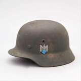 Heer, Stahlhelm M 35 mit beiden Abzeichen. - фото 1