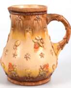 Изделия из фарфора. Art-Deco-Krug, Dümmler und Breiden, Preß-Nr. 1783, Keramik, beige/braun glasiert, mit Stern- und Floralrelief, H. 22 cm