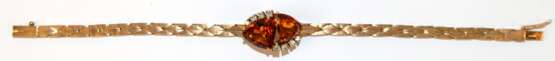 Armband, 585er GG, mittig 2 Citrine im Triangelschliff, flankiert von je 4 Brillanten, Kastenverschluß mit Sicherheitsacht, ges. 16,47 g, L. 18,5 cm - photo 1