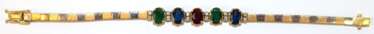 Bicolor-Armband, 750er GG/WG, Schauseite besetzt mit 2 Smaragden, 2 Saphiren, 1 Rubin und Brillanten, ges. 14,92 g, Schließe mi 2 Sicherheitsachten, L. 16 cm