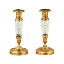 Paire de bougeoirs Empire des annees 1900. 