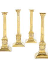 FOUR GEORGE III SILVER-GILT CANDLESTICKS