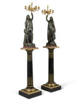 A PAIR OF FRENCH ORMOLU-MOUNTED AND PATINATED-BRONZE SIX LIGHT TORCHERES
