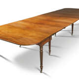 A REGENCY MAHOGANY CONCERTINA-ACTION DINING-TABLE - photo 1