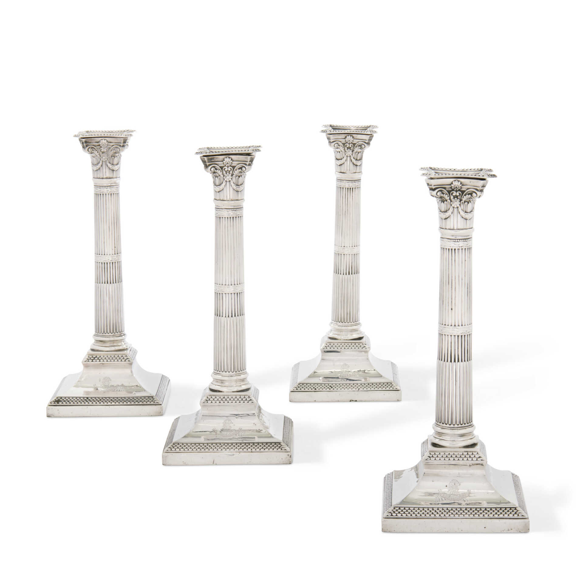 A SET OF FOUR VICTORIAN SILVER CANDLESTICKS