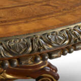 A VICTORIAN ORMOLU-MOUNTED AND PARCEL-GILT SATINWOOD, AMBOYNA AND MARQUETRY CENTRE TABLE - photo 3