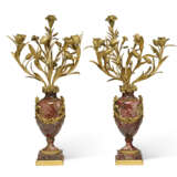 A PAIR OF NAPOLEON III ORMOLU-MOUNTED RED AND GREY MARBLE THREE-LIGHT CANDELABRA - photo 1