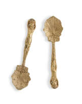 A PAIR OF GEORGE IV SILVER-GILT BERRY SPOONS