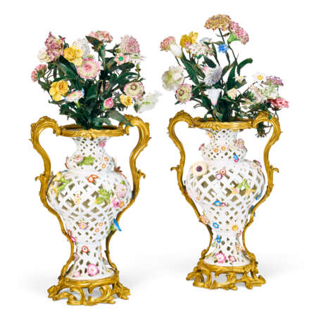 A PAIR OF ORMOLU-MOUNTED MEISSEN PORCELAIN RETICULATED VASES AND FLOWER BOUQUETS - photo 1