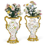 A PAIR OF ORMOLU-MOUNTED MEISSEN PORCELAIN RETICULATED VASES AND FLOWER BOUQUETS - photo 1