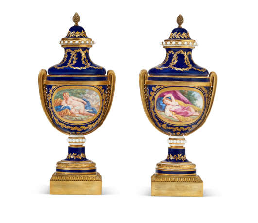 A PAIR OF ORMOLU-MOUNTED SEVRES PORCELAIN 'BLEU NOUVEAU' VASES (VASES CHAPELET) AND TWO COVERS - photo 1