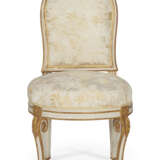 A NEAR PAIR OF LOUIS XVI WHITE-PAINTED AND PARCEL-GILT CHAISES - photo 2