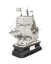 A GEORGE V SILVER PRESENTATION MODEL OF A SHIP