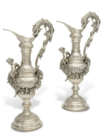 A PAIR OF ELIZABETH II LARGE SILVER EWERS - photo 1