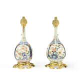 PAIRE D'AIGUIÈRES DE STYLE LOUIS XV - photo 2