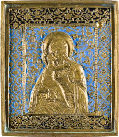 A BRASS AND ENAMEL ICON SHOWING THE VLADIMIRSKAYA MOTHER OF GOD - photo 1