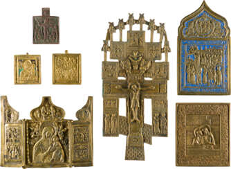 A COLLECTION OF SEVEN BRASS ICONS DEPICTING CRUCIFIX, IMAGES OF THE MOTHER OF GOD AND 'DO