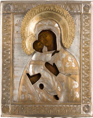 AN ICON SHOWING THE VLADIMIRSKAYA MOTHER OF GOD WITH OKLAD - photo 1