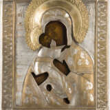 AN ICON SHOWING THE VLADIMIRSKAYA MOTHER OF GOD WITH OKLAD - photo 1