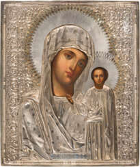 AN ICON SHOWING THE KAZANSKAYA MOTHER OF GOD WITH A SILVER-GILT OKLAD