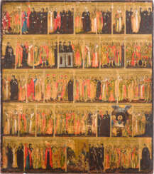A FINELY PAINTED AND LARGE MENOLOGICAL ICON FOR THE MONTH OF DECEMBER