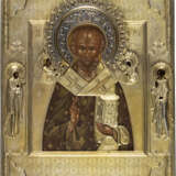 A FINE ICON SHOWING ST. NICHOLAS OF MYRA WITH A SILVER-GILT RIZA - photo 1