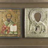AN ICON SHOWING ST. NICHOLAS OF MYRA AND A SILVER-GILT OKLAD - photo 1