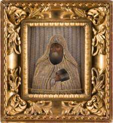 A SMALL DATED ICON SHOWING ST. MITROPHAN OF VORONEZH WITH EMBROIDERED OKLAD