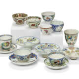 A GROUP OF K&#220;TAHYA POTTERY CUPS, SAUCERS AND CANDLE HOLDERS - photo 1