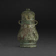 AN ARCHAIC BRONZE WINE VESSEL AND COVER, ‘JU FU DING’ YOU - Now at the auction